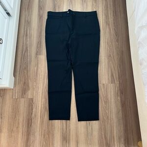 Navy pants from loft have never been worn in perfect condition